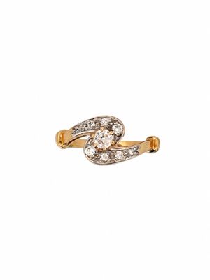 a close up of a diamond ring on a white background