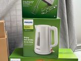 three boxes of philips appliances sit on a table next to a window