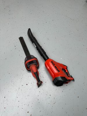two tools that are laying on the floor next to each other