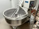 a machine that is sitting in a room with a lot of items