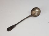 a silver spoon with a spoon handle on a white surface