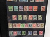 a close up of a picture of a book with stamps on it