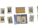 a lot of old photos on a white surface