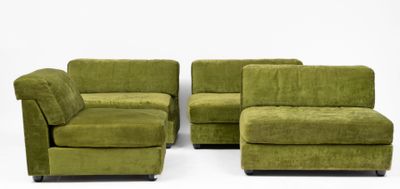 three green couches and a chair with a footstop on a white background