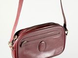 leather cross body bag with shoulder strap and snap closure