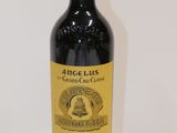 a bottle of wine that is sitting on a table