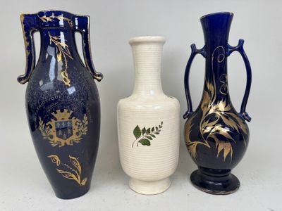three vases sitting next to each other on a table