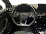 the interior of a car with a steering wheel and dashboard controls