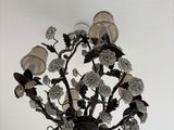 a chandelier hanging from the ceiling in a room