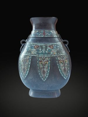 a blue vase with a design on it on a black background