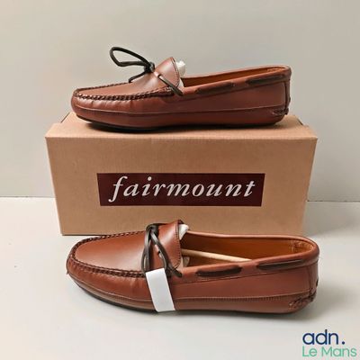 a close up of a pair of shoes on a box