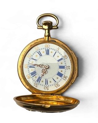 une montre de poche en or avec des chiffres romains