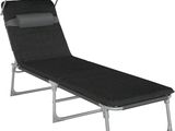 une image représentant une chaise longue sur laquelle est posé un plateau