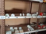 many boxes and packages on the shelves in the store