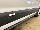 a close up of the side of a car with a sticker on it