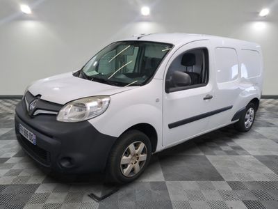 a picture of a white van parked on a checkered floor