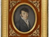 portrait d'un homme en veste noire et chemise blanche