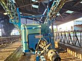 a blue machine that is sitting inside of a building