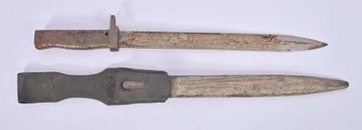 pair of old knifes on white surface with white background