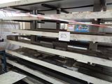 a large amount of shelves in a store with a price tag