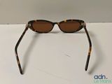 a close up of a pair of sunglasses on a table