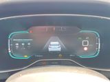 the dashboard of a car with a digital display on it