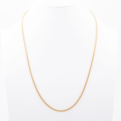 un collier à chaîne en or sur un mannequin mannequin mannequin mannequin mannequin mannequin mannequin mannequin mannequin mannequin