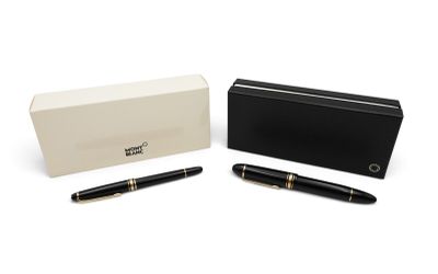 un stylo noir et doré posé à côté d'une boîte noire
