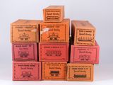 six boxes stacked on top of each other on a table