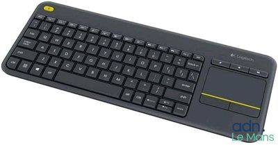 the keyboard is black and has a yellow button on it