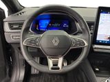 the interior of a car with a steering wheel, dashboard, and touch screen
