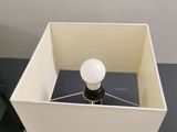 a lamp that is sitting on top of a table