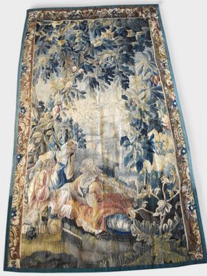 an image of a tapestry hanging on the wall of a room