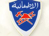 an image of a blue and red emblem on a white background