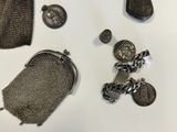 a lot of silver items that are on the table