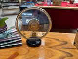 a wooden table with a clock on top of it