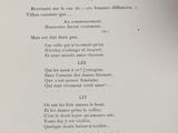 a black and white photo of a page of a poem