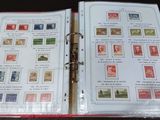 a binder with stamps on it sitting on a table
