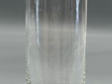 a glass that is sitting on a table