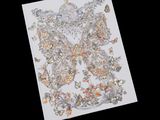 butterflies in a circle on a white paper with a black background