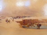 un tableau représentant un groupe de personnes à cheval dans le désert