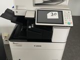 a printer that is sitting on top of a desk