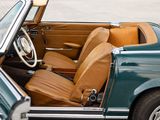 a close up of a car ' s interior with the door open