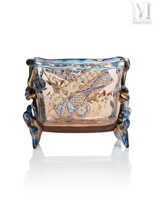a glass bowl with a dragon design on it