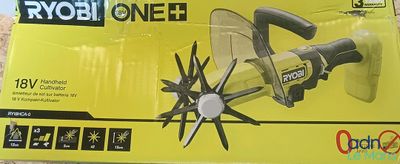 le carton d'une scie circulaire filaire Ryob OneG