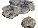 two pieces of rock with a hole in the middle of it