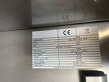 a picture of a stainless steel refrigerator with a price label
