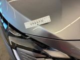 a close up of a car with a sticker on it