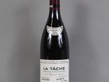 a bottle of wine that is sitting on a table