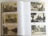 an open book with pictures of buildings on it